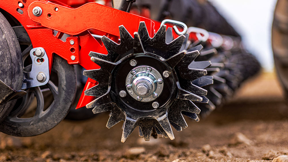 Closeup of ProDrain combined with  a pointed closing wheel on Väderstad Proceed V24