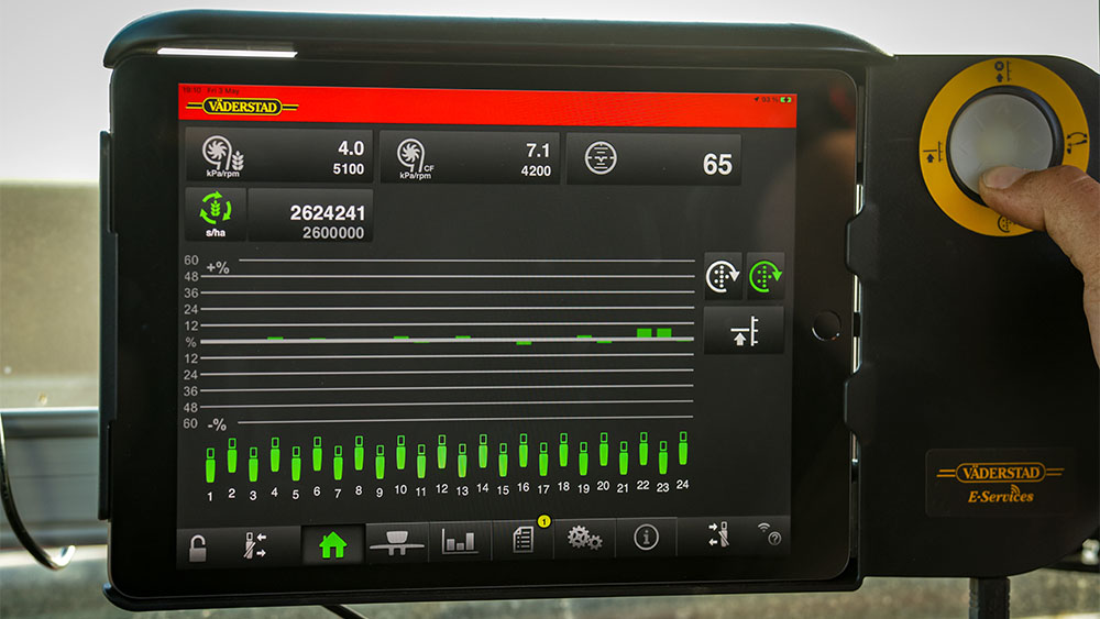 An iPad with E-control mounted in a tractor.