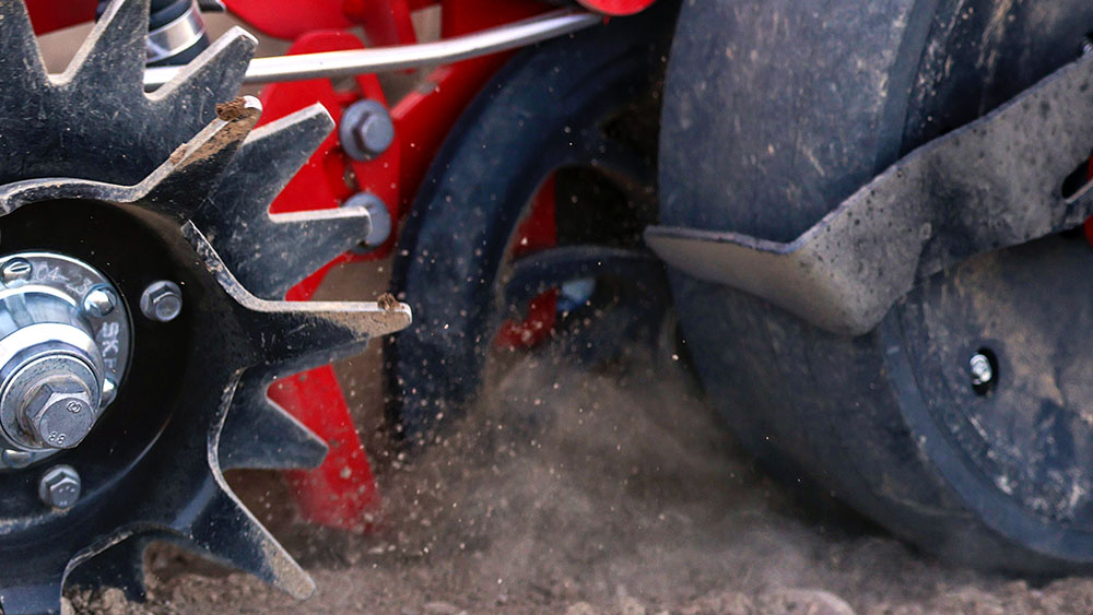 Stop wheel on the Proceed row unit
