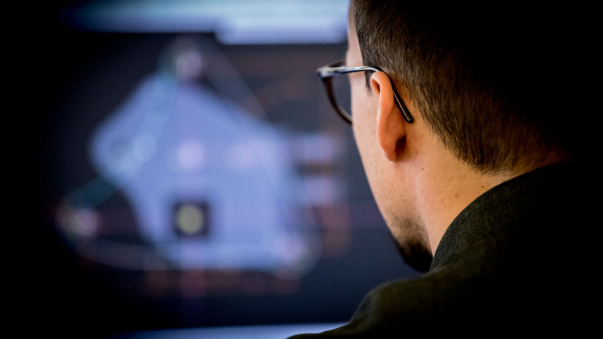 Man in front of computer